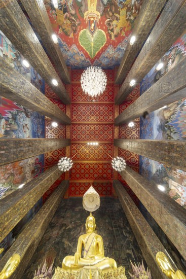 Frog's-eye view: coffered ceiling and golden Buddha statue, Bhumispara-mudra, Buddha Gautama at the moment of enlightenment, Wat Worawihan, Wat Prayurawongsawas Worawihan, Bangkok, Thailand, Asia