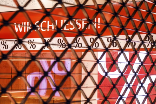 Cologne, North Rhine-Westphalia, Germany - Cologne city centre in times of the corona crisis during the second lockdown, clearance sale due to shop closures