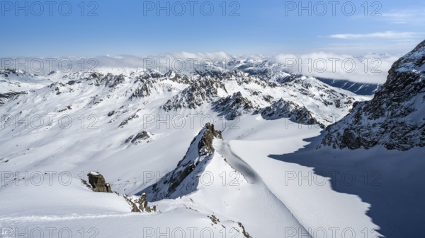 Mountain ridge of Piz Kesch, ascent on Piz Kesch or Piz d'Es-cha in winter, spectacular mountain landscape, view of mountain panorama with glacier Vadret da Porchabella, Albula Alps, Rhaetian Alps, Grisons, Eastern Switzerland, Switzerland, Europe