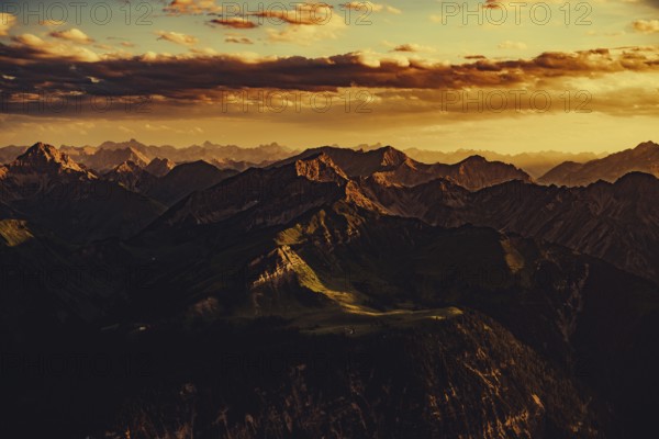 Thaneller summit at sunset in the Lechtal valley in Tyrol with a wonderful view of the surrounding mountains. Tyrol, Austria, Europe