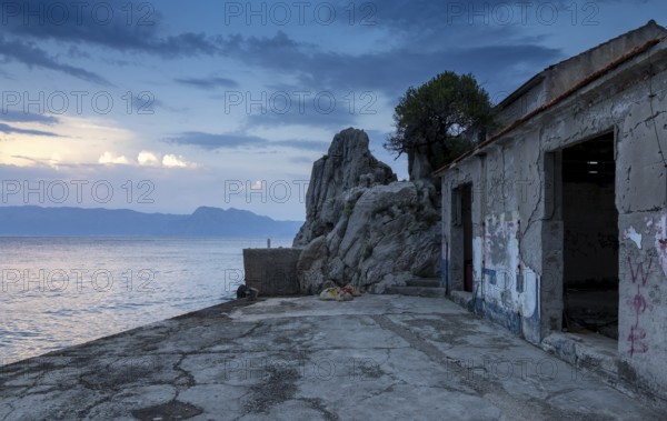 Lost place, dilapidated building by the sea in a quiet evening mood, Peljesac, Neretva, Croatia, Europe