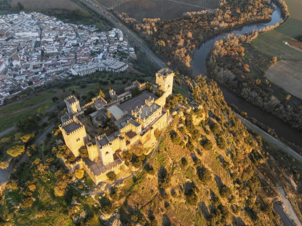 The impressive eighth-century Moorish castle of Almodóvar del Río perches high above the Guadalquivir river valley. Aerial view. Drone shot. Córdoba province, Andalusia, Spain, Europe
