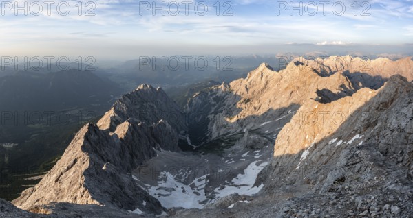 Impressive rocky mountain landscape in the evening light, steep mountain ridge, Jubiläumsgrat and Waxensteinkamm, view into the Höllental, mountain panorama from the Zugspitze, Wetterstein range, Bavaria, Germany, Europe