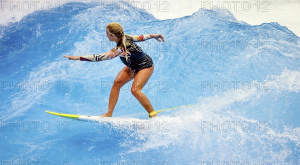 Messe boot Düsseldorf, Surfer riding a standing indoor wave on the occasion of a press event, Düsseldorf, North Rhine-Westphalia, Germany, Europe