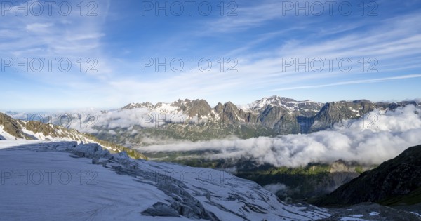 View of mountain peaks and the valley of Chamonix with high fog, Chamonix, Haute-Savoie, France, Europe