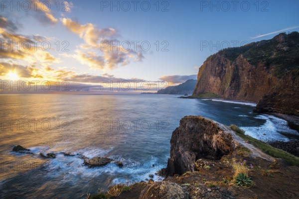 View of Madeira scenic cliffs coastline landscape on sunrise, Guindaste viewpoint, Madeira island, Portugal, Europe