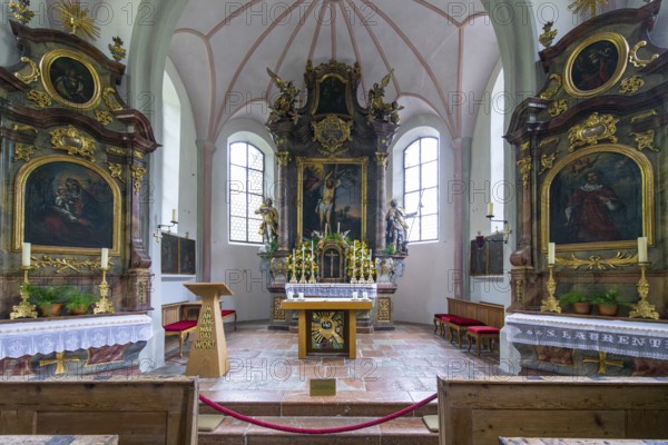 Parish church of St Sebastian with richly decorated altar, statues of saints and paintings, framed by a vaulted ceiling and large windows, Ramsau, Berchtesgadener Land, Bavaria, Germany, Europe