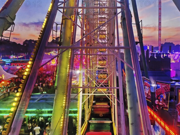 View from the Ferris wheel at the Cranger Kirmes in the evening, Herne, Ruhr area, North Rhine-Westphalia, Germany, Europe
