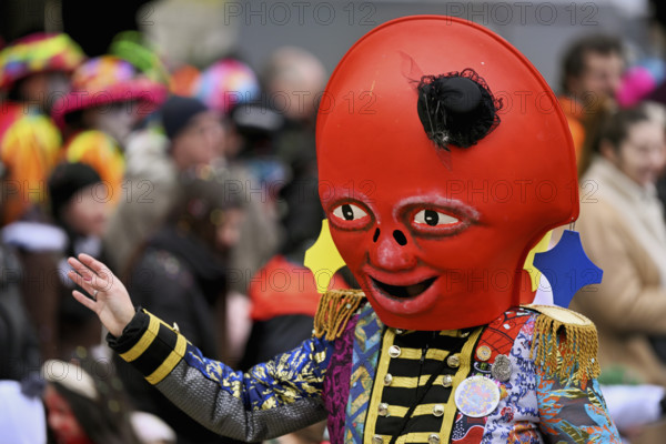 Person dressed up as a red mascot at the Wey guild on Rose Monday, Güdismäntig, Lucerne Carnival 2024, Lucerne, Switzerland, Europe