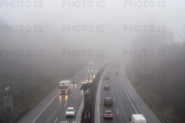 Dense fog, with visibility sometimes less than 100 metres, A52 motorway, in Essen, North Rhine-Westphalia, Germany, Europe