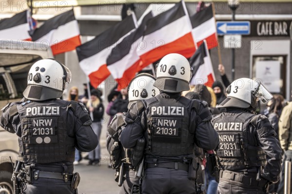 The neo-Nazi group Jung und Stark, JS, demonstrates in the city centre of Essen, demanding the remigration of foreigners, chanting Deutschland den Deutschen Ausländer raus, approx. 150 ultra right-wingers, dressed in black and wearing typical scene clothing, several groups demonstrate against the Nazi march, Essen, North Rhine-Westphalia, Germany, Europe