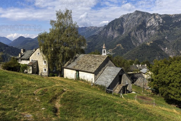 View of the village, typical Ticino stone houses in the mountain village of Rasa, Centovalli, Canton Ticino, Switzerland, Europe