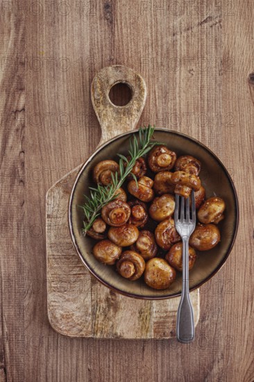 Fried mushrooms, with spices, in soy sauce, vegetarian food, homemade, no people