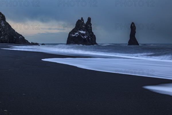 Black beach, waves, spray, dark clouds, winter, light mood, rocks, Dyrholaey, Vik, Iceland, Europe