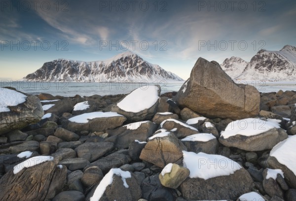 Winter evening mood at Skagsanden, stones on the beach near Flakstad, Flakstadøy, Lofoten, Nordland, Norway, Europe