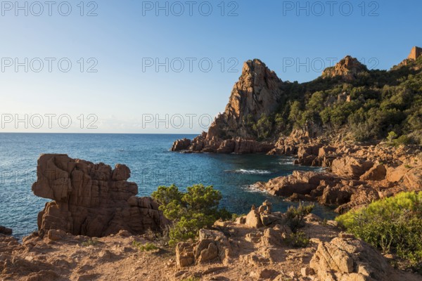 Red rocks and sea, Spiaggia Su Sirboni, sunrise, near Tertenia, Province of Ogliastra, Sardinia, Italy, Europe