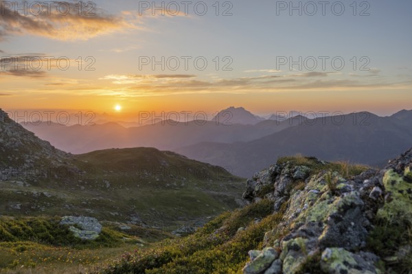 View of mountains at sunrise with spectacular horizon, Tyrol, Austria, Europe