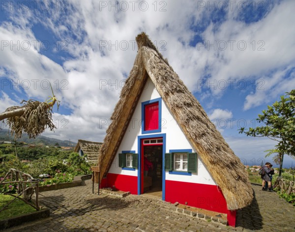 Typical traditional thatched houses Casinhas de Santana, landmark, UNESCO biosphere reserve, tourist event, municipality of Santana, Madeira, Portugal, Europe