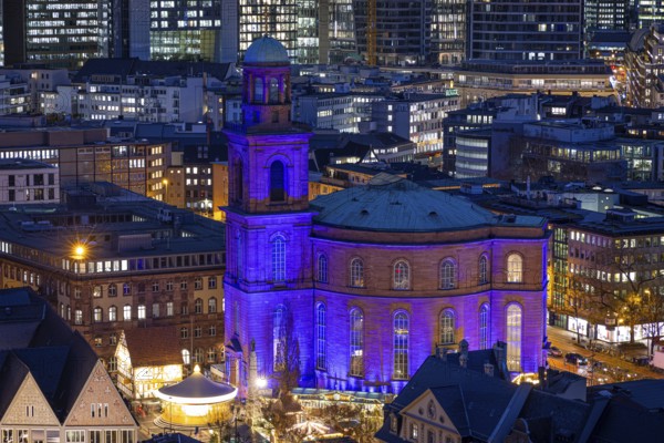 St Paul's Church in Frankfurt am Main will be illuminated in blue in the middle of the Christmas market on 10 December 2024, International Human Rights Day. This commemorates the declaration of the UN Human Rights Charter of 10 December 1948. Frankfurt am Main, Römerberg, Hesse, Germany, Europe