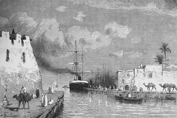 Harbour facilities of the town of La Goulette or La Goletta on the Mediterranean near Tunis, pier with steamship under sail, sailing ships, camels, horsemen, adobe buildings, Arabs, travel, Tunisia, historical illustration 1886, Africa