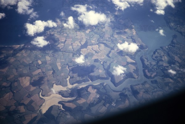 Portrait oblique aerial view of tributaries in the Fal estuary near Lamorran, Cornwall, England, UK around 1970