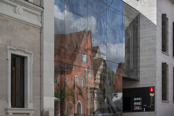 Reflection in the facade of the service centre, former old school, Iphofen, Lower Franconia, Bavaria, Germany, Europe