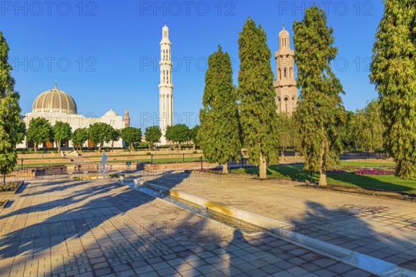 Park of the Sultan Qaboos Mosque, behind the mosque with the domes and minarets, Muscat, Arabian Peninsula, Sultanate of Oman