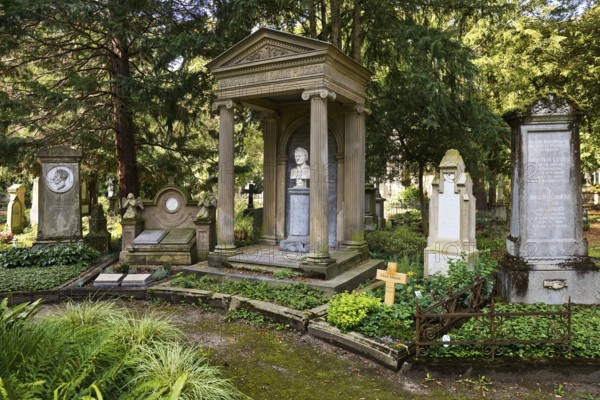 Old gravestones surrounded by green nature, Old Cemetery, Bonn, North Rhine-Westphalia, Germany, Europe