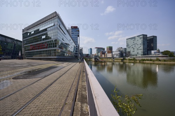 Media harbour with modern buildings on the street Am Handelshafen in Düsseldorf, state capital, independent city, North Rhine-Westphalia, Germany, Europe