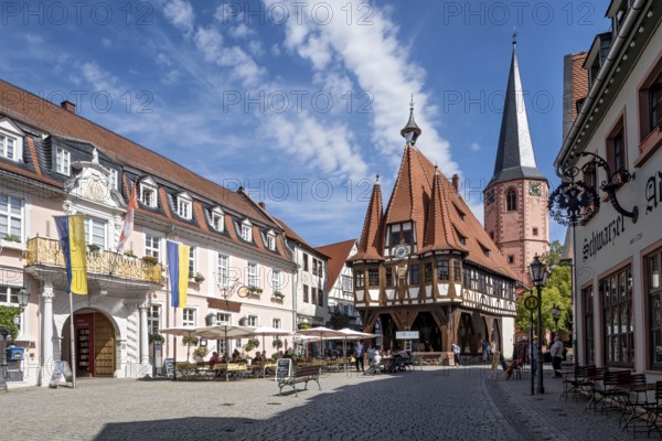 Baroque Löwenhof, Gasthaus Zum goldenen Löwen and Posthalterei von Thurn und Taxis, post office, old town hall, late medieval half-timbered building, Gothic, cultural monument, bell tower of the town church, street café, pedestrian zone, market square, historic old town, contrails, Michelstadt, Odenwald, Hesse, Germany, Europe