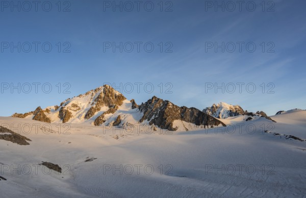High alpine mountain landscape at sunset, Glacier du Tour, Glacier and mountain peaks in the evening light, summit of the Aiguille de Chardonnet, Chamonix, Haute-Savoie, France, Europe