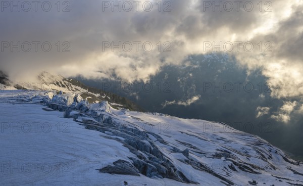 Glacier ice with crevasses in the evening light, Glacier du Tour at sunset, High alpine mountain landscape, Chamonix, Haute-Savoie, France, Europe