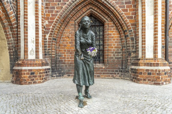 Grete-Minde monument in front of the historic town hall in Tangermünde, Saxony-Anhalt, Germany, Europe