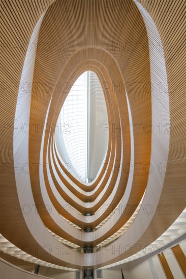 Futuristic interior design with spiral-shaped wooden structures and glass roof, UB- Recht, Zurich, Switzerland, Europe