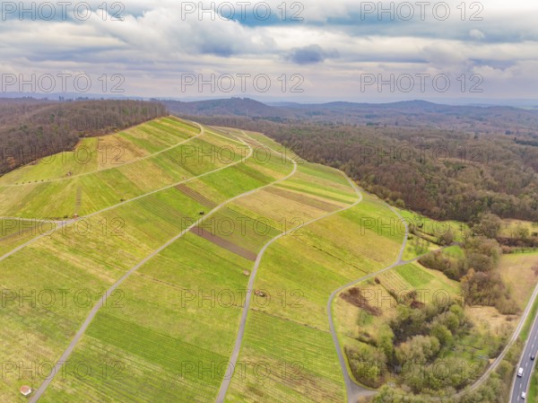 Aerial view of green hills and roads, embedded in forests and fields, Großbottwar, Ludwigsburg district, Baden-Württemberg, Germany, Europe