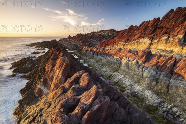 Colourful rocks on the coast, Varanger, Barents Sea, Finnmark, Norway, Europe
