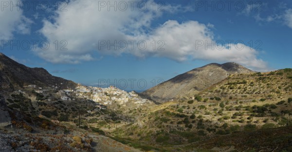 A vast landscape with mountains and the picturesque village of Olymbos in the valley under a clear sky, Olymbos, Karpathos, Greece, Europe