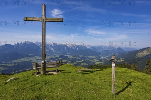 Summit cross on the Taborberg with a view of the Lammertal and Tennengebirge mountains, Osterhorn group, Salzkammergut, Salzburg province, Austria, Europe