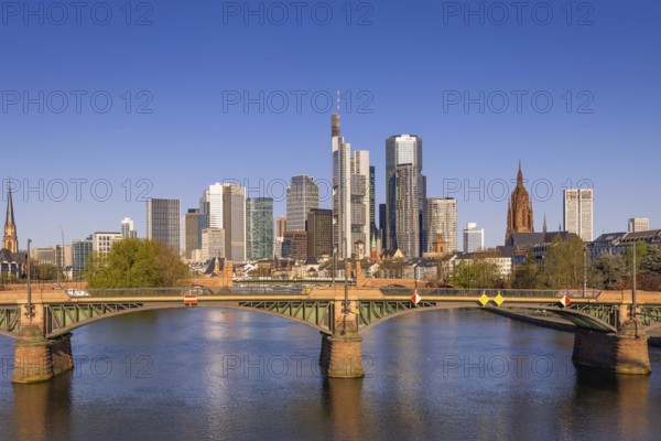 The sun shines on the skyscrapers of Frankfurt's banking skyline in the morning, Frankfurt am Main, Hesse, Germany, Europe
