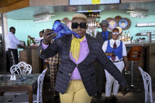 Sapeuse, member of the Société des Ambianceurs et des Personnes élégantes (SAPE), society of entertainers and stylish people, Brazzaville, Republic of Congo
