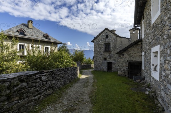 View of the village, typical Ticino stone houses in the mountain village of Rasa, Centovalli, Canton Ticino, Switzerland, Europe