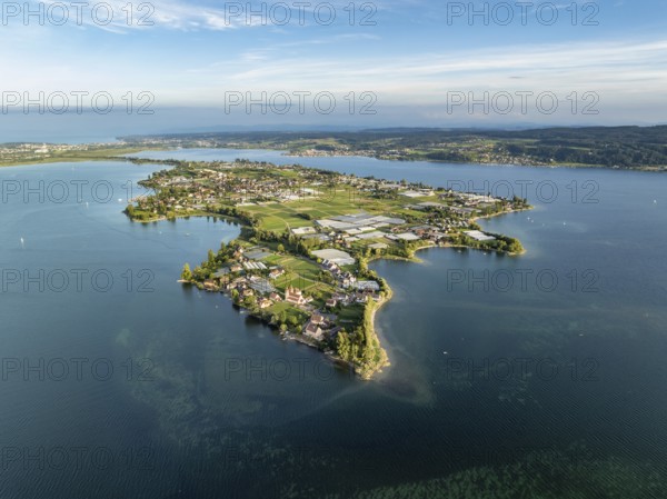 Aerial view, of the north-western tip of the island of Reichenau in Lake Constance, with the district of Niederzell and the columned basilica of St Peter and Paul, with Windegg Castle on the shore, district of Constance, Baden-Württemberg, Germany, Europe