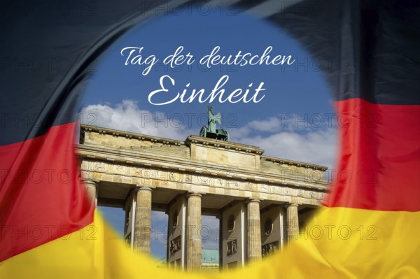 Brandenburg Tor in Berlin on a German flag (Composing), with the lettering DAY OF GERMAN UNITY