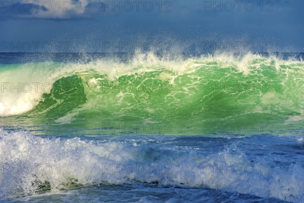 Wave on Ipanema beach illuminated by the afternoon sun Rio de Janeiro, RJ, Brazil, South America