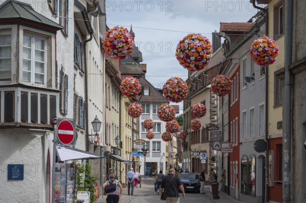 Colourful flower balls decorate the streets of, Villingen-Schwenningen, Baden-Württemberg, Germany, Europe