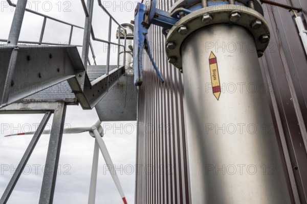 Pipelines, a biogas plant, the gas is produced from various biomass, the electricity is generated in combined heat and power plants with the biogas produced and sold to companies in the neighbouring industrial estate, the heat generated is fed into a local heating network, Ense, North Rhine-Westphalia, Germany, Europe