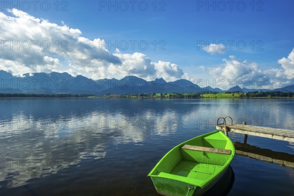 Green rowing boat, Hopfensee, Hopfen am See, near Füssen, Ostallgäu, Allgäu, Bavaria, Germany, Europe