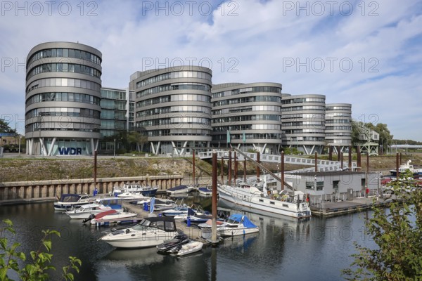 Duisburg, Ruhr area, North Rhine-Westphalia, Germany, Duisburg inner harbour. Marina Duisburg, the marina in the inner harbour in front of the Five Boats office building with the WDR regional studio Duisburg, Europe
