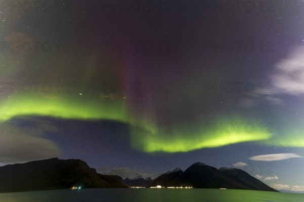 Northern Lights, (Aurora borealis) at a fjord near Skjiervoya, September 2024, Lapland, Finnmark, Norway, Europe
