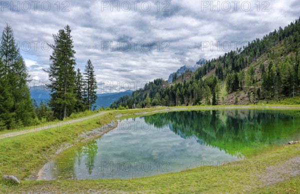 Panoramic lake, mountain lake, Stubai Alps near Telfes and Fulpmes, high mountains of the Alps, weather mood, cloud mood, Tyrol, Austria, Europe